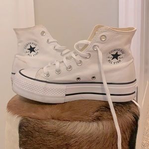 White platform high top converse. Women’s size 6. Men’s size 5.